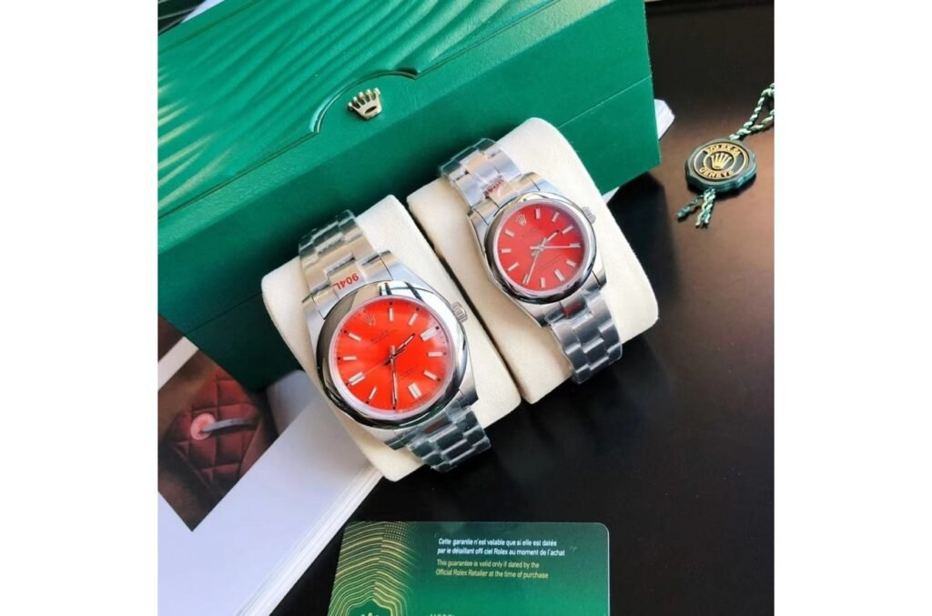 Replica Rolex Oyster Perpetual SS/SS Red/Stk 31/41 mm Dial Details