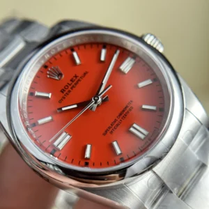 Replica Rolex Oyster Perpetual Coral Red Dial 124300 41 mm