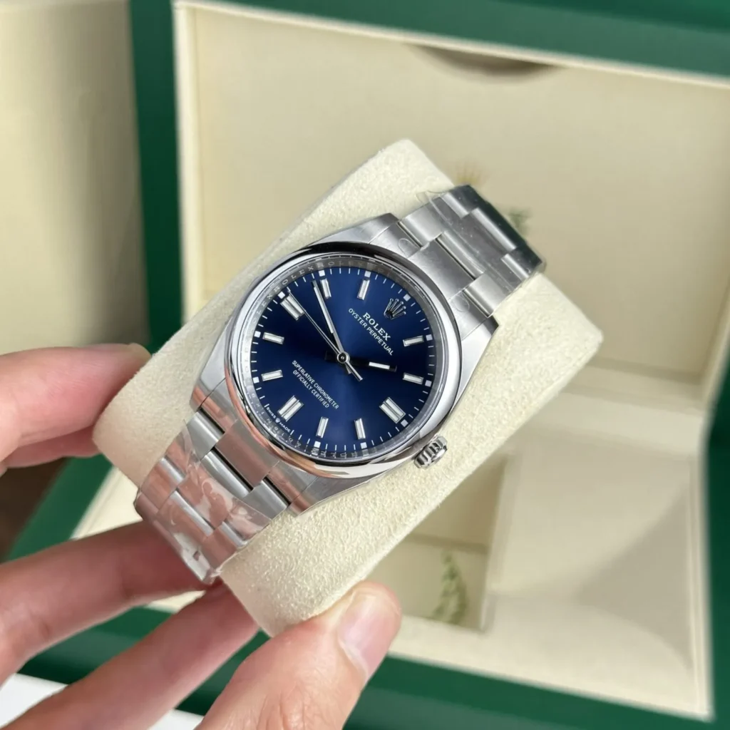 Replica Rolex Oyster Perpetual Lady Blue Dial 126000 36 mm Bezel & Crystal